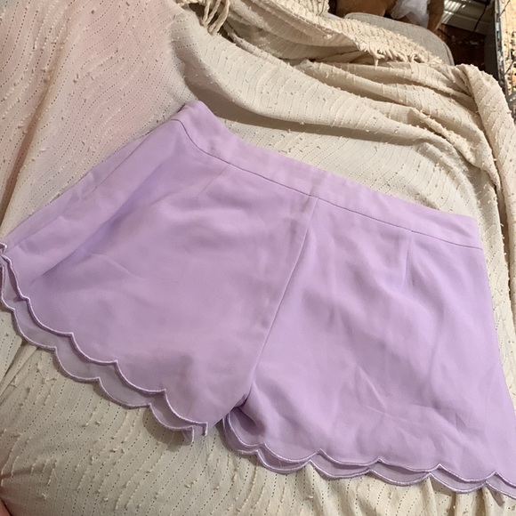 Lilac purple shorts flower detail at the bottom brand Tobi size small (2-4) - Picture 2 of 2